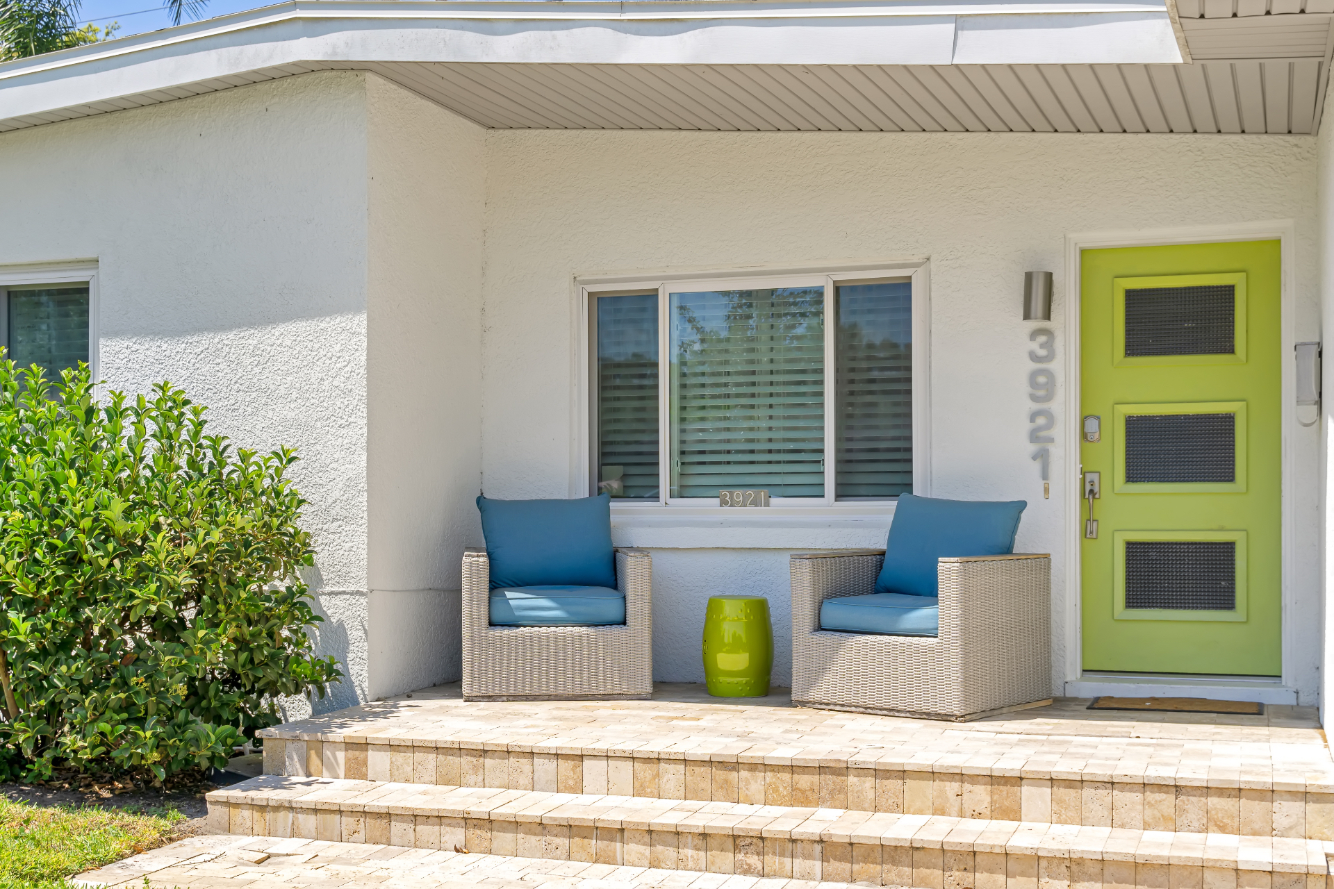 Covered front porch seating at The Garden at Ibis