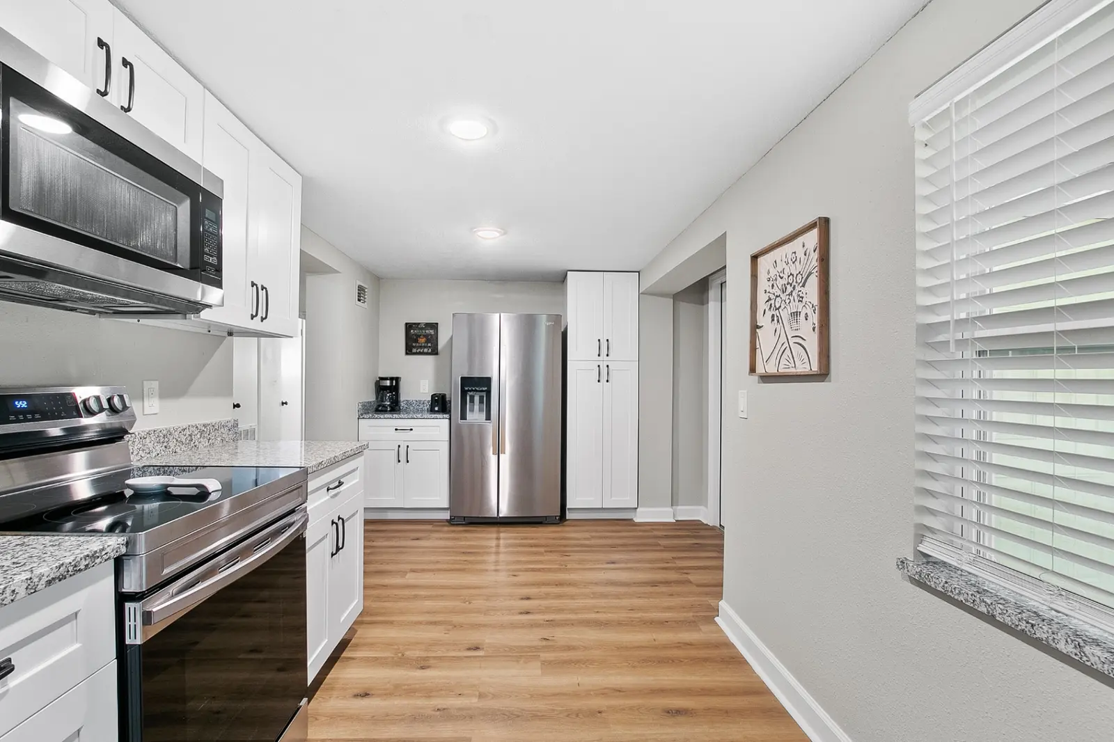 Bright kitchen with modern appliances at The Garden at Bennett